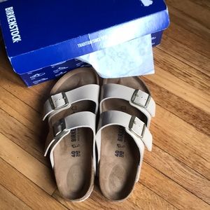 Never worn Arizona Birkenstock sandals.
